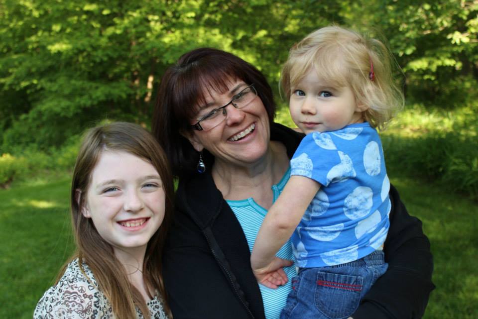 Me, with Abby (Sara's) and holding Kate (Molly's), June 2013. Photo credit: Mike Beck
