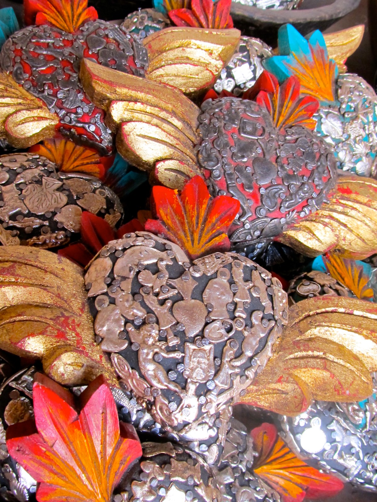 Box of milagro-covered hearts, Santa Fe, NM