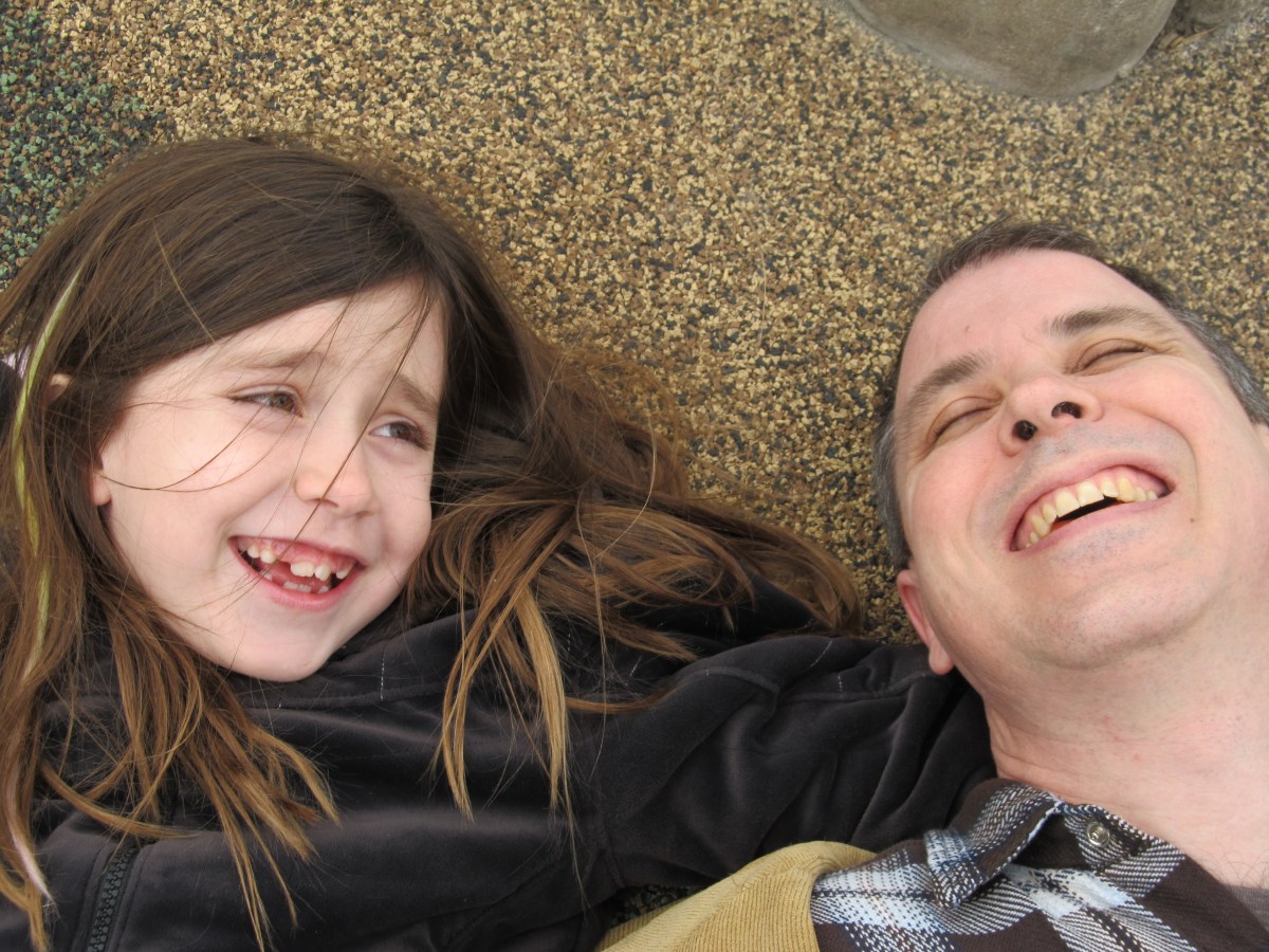 Matt and Zoe Rose being silly at the park!